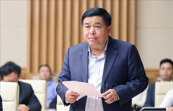 Bộ trưởng Bộ Kế hoạch và Đầu tư Nguyễn Chí Dũng phát biểu. Ảnh: Dương Giang-TTXVN
